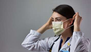 A healthcare workers with a face covering. File photo courtesy of © Can Stock Photo / jmac2324