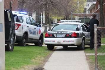 Windsor police investigate a stabbing in the 400 block of Glengarry Ave., April 22, 2015. (Photo by Jason Viau)