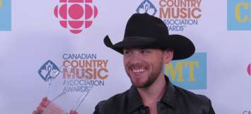 Brett Kissel with his male artist of the year award at the CCMA Awards in London, September 11, 2016. (Photo by Miranda Chant, Blackburn News)