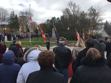 The colour guard marches to the cenotaph in downtown Wingham, Ontario for the annual Remembrance Day ceremony. (Photo by Ryan Drury)