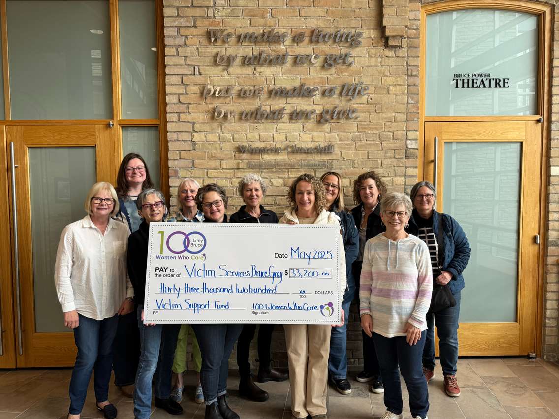 Back row l to r - Danielle Thede, Brenda Vanderploeg, Beverlee Gateman, Peri Ongarato, Yvonne McCutcheon, Pam Kraft Front row l to r - Lynda Legge, Paula Carere, Jane Hatley, Executive Director, Victim Services Bruce Grey, Debb Bodkin, Debbie Pegelo.  Photo from 100 Women Who Care