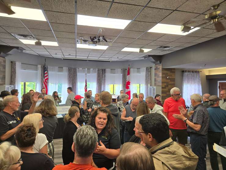 A crowd gathers for Indwell's drop in open house for its supportive housing project on George St. in Sarnia (Sarnia News Today photo by Josh Boyce)