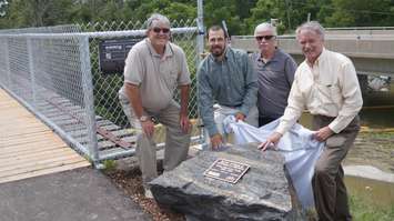 Unveiling the memorial for Ron Yorke at the newly renovated bridge on Howard Watson Nature Trail. June 29, 2015 (BlackburnNews.com Photo by Briana Carnegie)