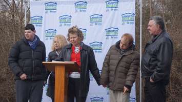The Hastings and Hutchinson families speak at a celebration ground breaking for their new home on Devine St. April 13, 2016 (BlackburnNews.com Photo by Briana Carnegie)