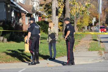 Police investigate after a girl was hit by a vehicle at Tecumseh Rd. W and Dougall in Windsor. (Photo by Adelle Loiselle)