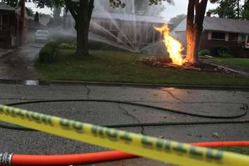 Lightning strikes a gas line in the 1100-block of Belleperche Pl., September 3, 2015. (Photo by Jason Viau)