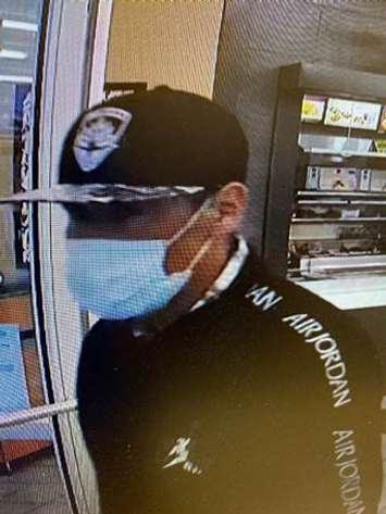 Chatham-Kent police are looking for this man in connection with a fraud investigation in Wallaceburg. (Photo courtesy of Chatham-Kent police)