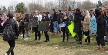 A. B. Lucas secondary school students hold protest signs during student walk outs, April 4, 2019. (Photo by Miranda Chant, Blackburn News)