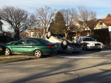 Windsor police respond to a rollover accident at the intersection of Pierre Ave. and Ellis St. E on December 1, 2014. (Photo by Jason Viau)