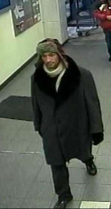 Police are looking for this suspect following a robbery at a CIBC in Tillsonburg. (Photo courtesy of the Ontario Provincial Police)