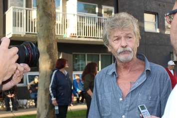 A resident speaks with reporters after a fire at an apartment building on Rivard Ave. in Windsor, October 7, 2015.  (Photo by Adelle Loiselle)