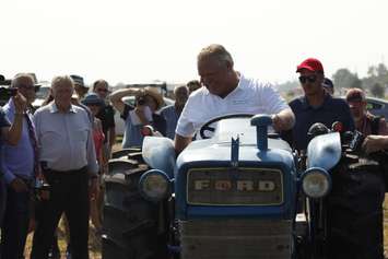 Ontario Premier Doug Ford participates in the VIP plowing match against Opposition Leader Andrea Horwath. (Photo by Angelica Haggert)