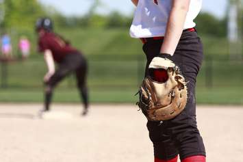 Softball players on the field. © Can Stock Photo Inc. / pklick360
