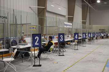 The registration area at the mass vaccination clinic at the Libro Credit Union Centre in Amherstburg, March 29, 2021. (Photo by Maureen Revait) 