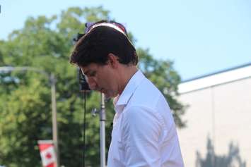 Prime Minister Justin Trudeau prepares to address Canada Day celebrations in Ottawa via video from Leamington, July 1, 2018 (Photo by Adelle Loiselle)