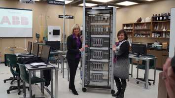 Lambton College President Judith Morris and ABB President Nathalie Pilon reveal advanced process control donation. January 21, 2016 (BlackburnNews.com Photo by Briana Carnegie)