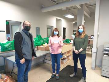 Left to right -- Mark Huston, Brenda LeClair with Outreach for Hunger, Emily Charbonneau. (Photo courtesy of Emily Charbonneau, GFO District 2 Chair)