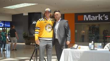 Jordan Ernst with Sarnia Sting GM Nick Sinclair. (photo by Jake Jeffrey blackburnnews.com)