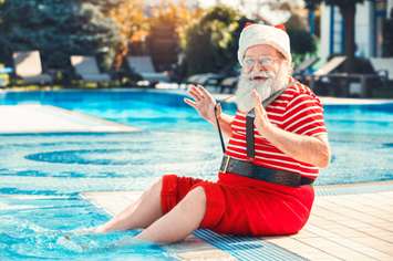 Santa Claus on holiday (Image by	Sergii Gnatiuk / iStock / Getty Images Plus)