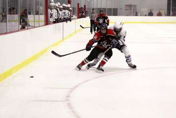 Lucas Vanroboys (front) battles for a puck. (Photo courtesy of Gina Vanroboys)