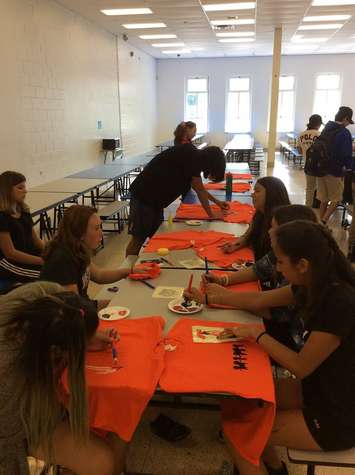 Students at Great Lakes Secondary School decorating orange shirts. September 22, 2018. (Photo from the GLSS facebook page)