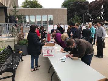 People gather at a rally to end poverty in Sarnia. October 5, 2018 Photo by Melanie Irwin
