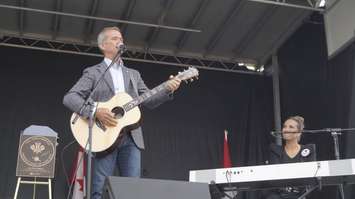 Chris Hadfield sings with fellow Sarnia native Emm Gryner at Canada’s Walk of Fame Hometown Star Celebration. August 6, 2019. (BlackburnNews photo by Colin Gowdy)