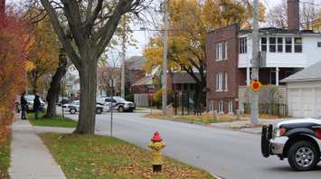 Windsor police investigate a man barricaded inside of an apartment on the corner of Lincoln Rd. and Richmond St., November 12, 2014. (photo by Mike Vlasveld)