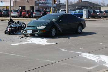One person has been sent to hospital following a crash at the intersection of Lauzon Rd. and McHugh St., April 1, 2015. (Photo by Jason Viau)