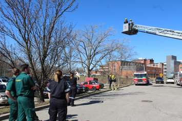 Faculty from Centennial College up on the aerial ladder at CKFES Headquarters. March 29, 2017. (Photo by Natalia Vega)