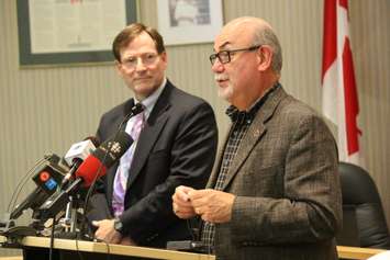 Windsor Essex County Health Unit Medical Officer of Health Gary Kirk, left, and board chair Gary McNamara release details about a new funding boost, September 17, 2015. (Photo by Jason Viau)