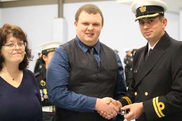 Emanuel Sousa (centre) is recognized for reaching the silver level of the Duke of Edinburgh Award at the HMCS Hunter building in Windsor, Ontario on October 28, 2015. (Photo by Ricardo Veneza)