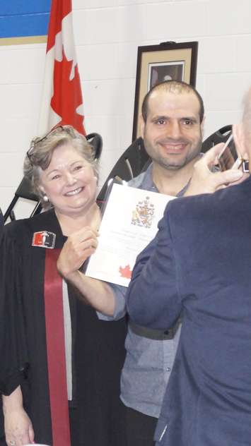 35 new Canadians take the oath of citizenship at St. Patrick's High School in Sarnia. May 8, 2018 (Photo by Melanie Irwin)