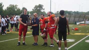 The Sarnia Imperials receiving their Western Conference Championship trophy. (photo by Jake Jeffrey blackburnnews.com)