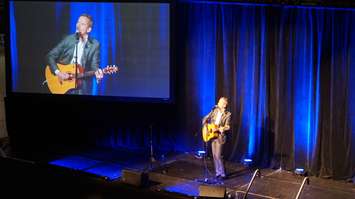 Chris Hadfield performs for local high school students during a keynote address in Sarnia. May 25, 2016 (BlackburnNews.com Photo by Briana Carnegie)