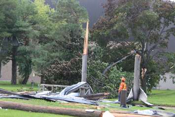 Crews assess and clean up the damage left near the EC Row Expressway and Central Avenue in Windsor on August 25, 2016 after a tornado hit the area. (Photo by Ricardo Veneza)