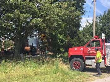 A fire that rekindled in an abandoned home in Thamesville was extinguished by Chatham-Kent firefighters. 
July 18, 2017. (Photo by Sarah Cowan Blackburn News Chatham-Kent). 