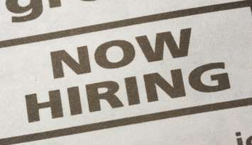 Now hiring ad in newspaper. (File photo courtesy of © Can Stock Photo)