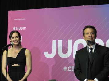 Tessa Virtue and Rick Mercer speak to media at the 2019 Juno Awards at Budweiser Gardens, March 17, 2019. (Photo by Miranda Chant, Blackburn News)