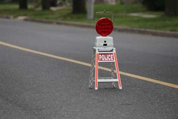 Windsor police investigate a shooting on Howard Ave. at Erie St., September 9, 2015. (Photo by Jason Viau)