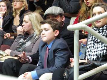 9-year-old Corinthian Bennett, watches Prime Minister Trudeau speak at a town hall at Western University, January 13, 2017. (Photo by Miranda Chant, Blackburn News)
