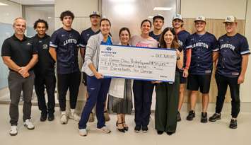 Members of the Lambton College baseball team present a $50,000 cheque to the Bluewater Health Foundation (Submitted photo)