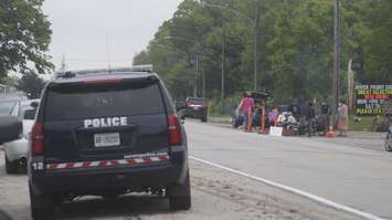 A Sarnia Police cruiser at the protest of a planned gas station on St. Clair Pkwy. June 3, 2021.  (BlackburnNews file photo)