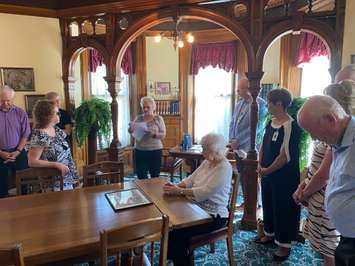Remaining members, and family of those who've passed, of Charlotte's Task Force gather in the Corey Room for a plaque dedication at Petrolia's Charlotte Eleanor Englehart Hospital [CEEH]. May 31, 2023 Photo by Melanie Irwin.