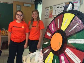Grade 11 and 12 students at Ursuline College in Chatham set up a booth with games and prizes focused on sharing information on the dangers of tanning on June 2, 2016. (Photo by Ricardo Veneza)