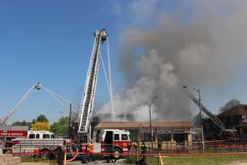 Thick smoke rising from a fire at Le Chef Restaurant in Windsor,  May 23, 2016.  (Photo by Adelle Loiselle)