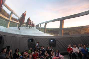 An audience watches as images from the film Horizon are shown on a 360 screen in the SesquiDome in Windsor on July 7, 2017. Photo by Mark Brown/Blackburn News)