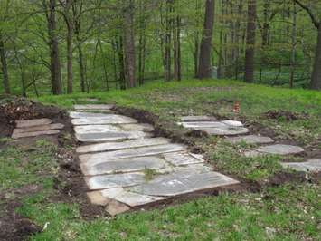 Confederation-era tombstones uncovered by Western students at Woodland Cemetery. (Photo by Miranda Chant, Blackburn News)