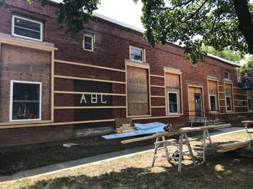 Exterior work continues on the former ABC Daycare, which will now offer transitional housing. August 8, 2019 Photo by Melanie Irwin