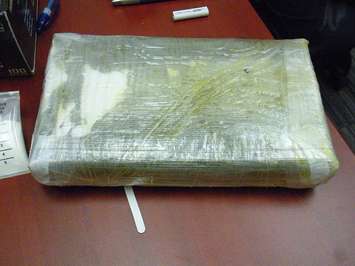 Brick of Cocaine seized at Blue Water Bridge Nov 19, 2014 (RCMP Photo)